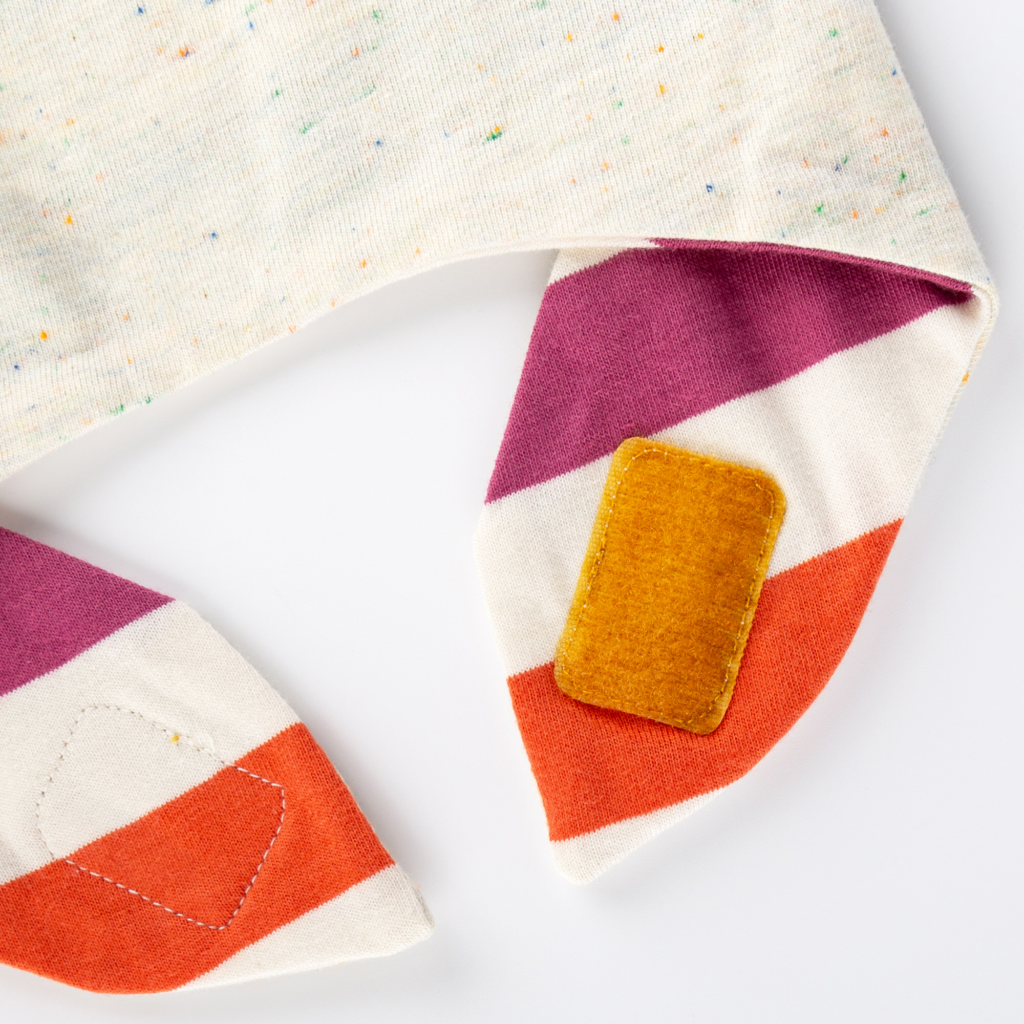 Snug reversible baby bandana bib, beige/multicoloured
