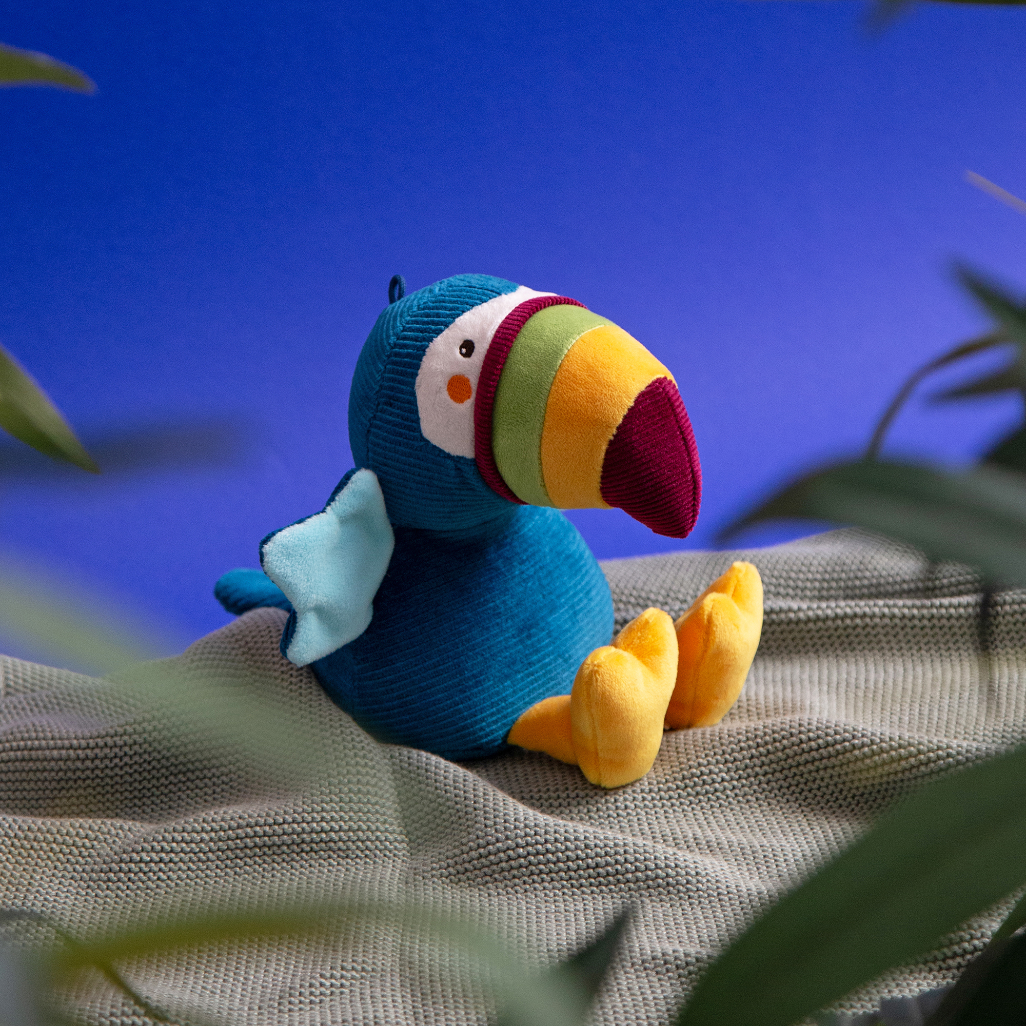 Musical baby soft toy toucan