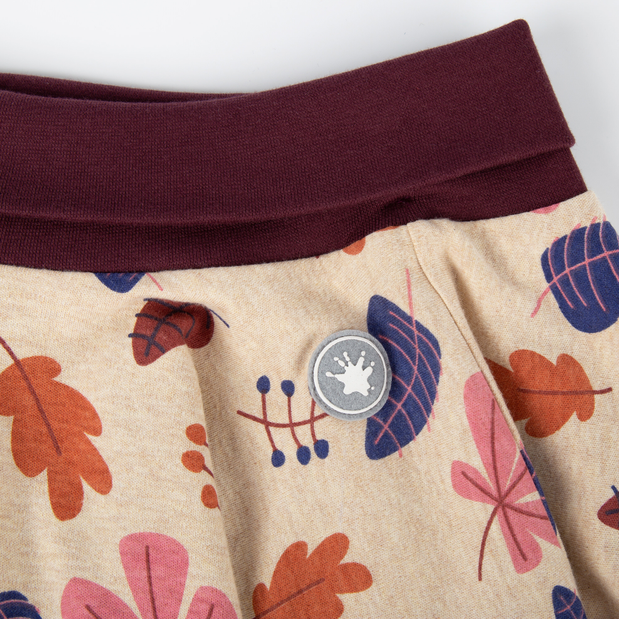 Kinder Wenderock, dunkelrot oder beige mit Blätterprint Kinder Wenderock, dunkelrot oder beige mit Blätterprint