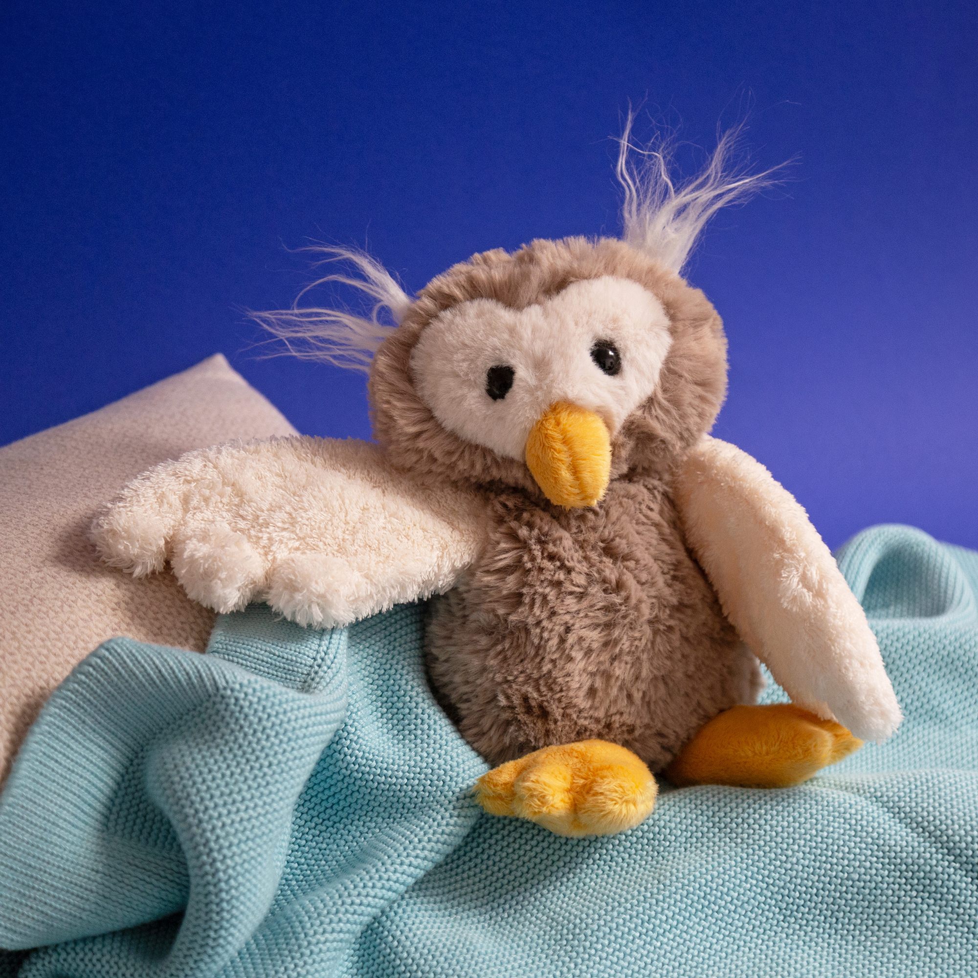 Kuscheltier Eule liegend beige, Flauscherie