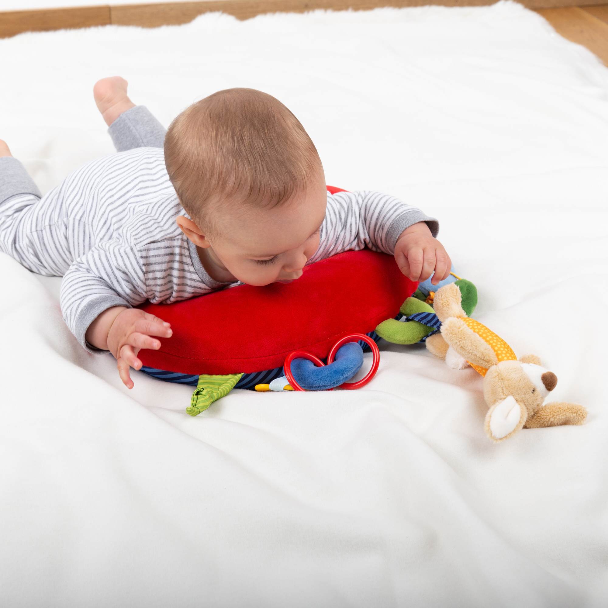 Tummy time pillow with toys