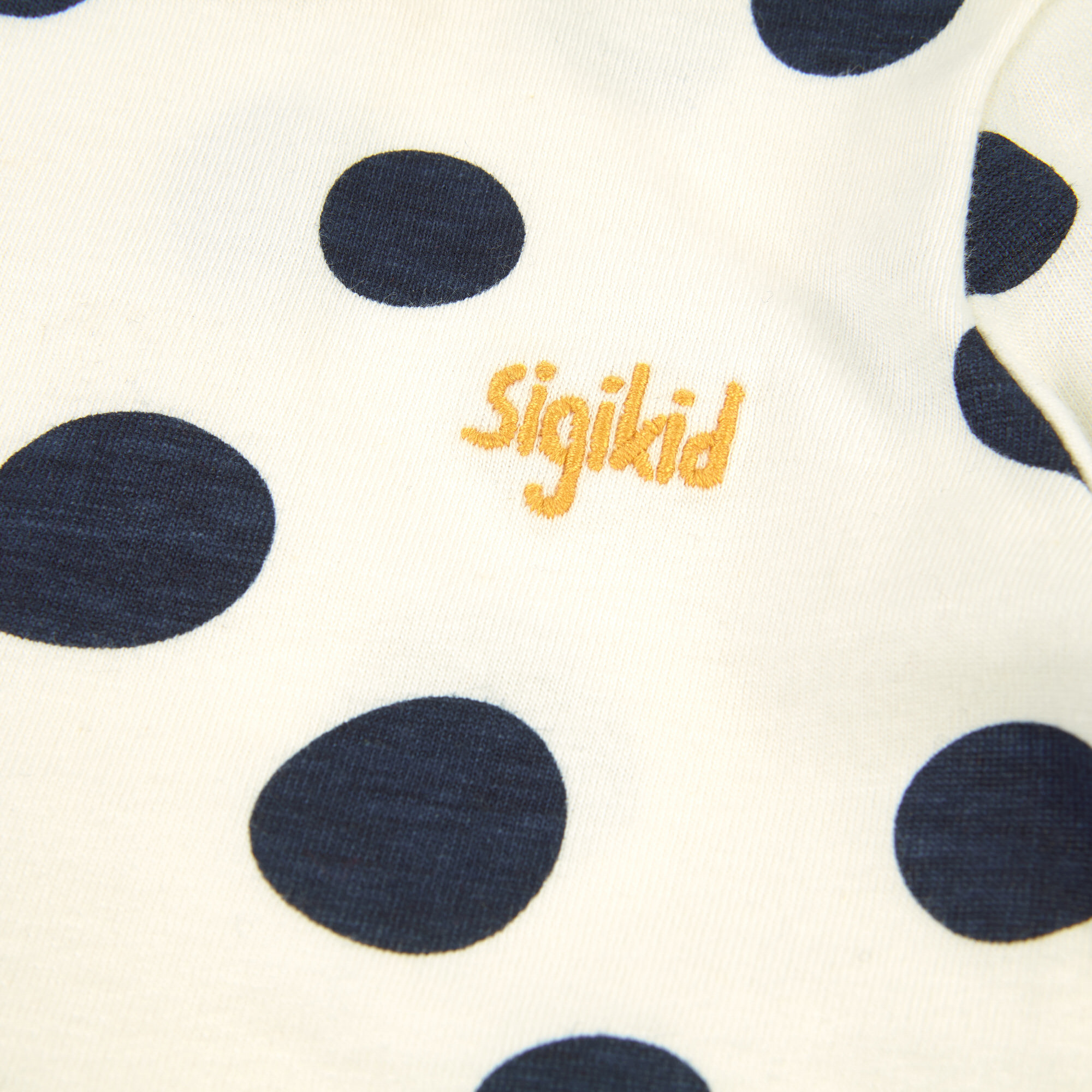 Cream white baby long sleeve Tee with navy dots