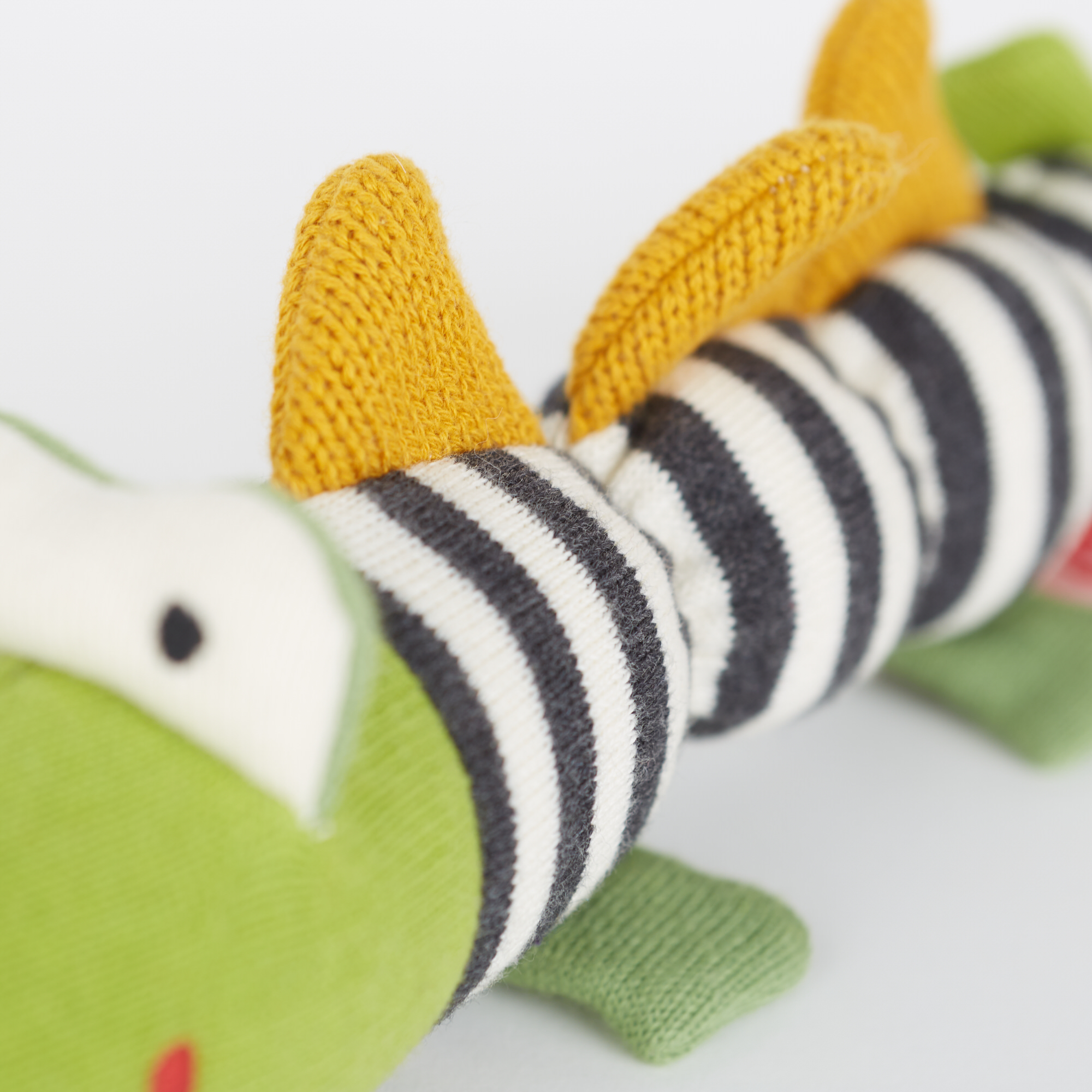 Knitted grasp toy crocodile, with rattle and wooden teether