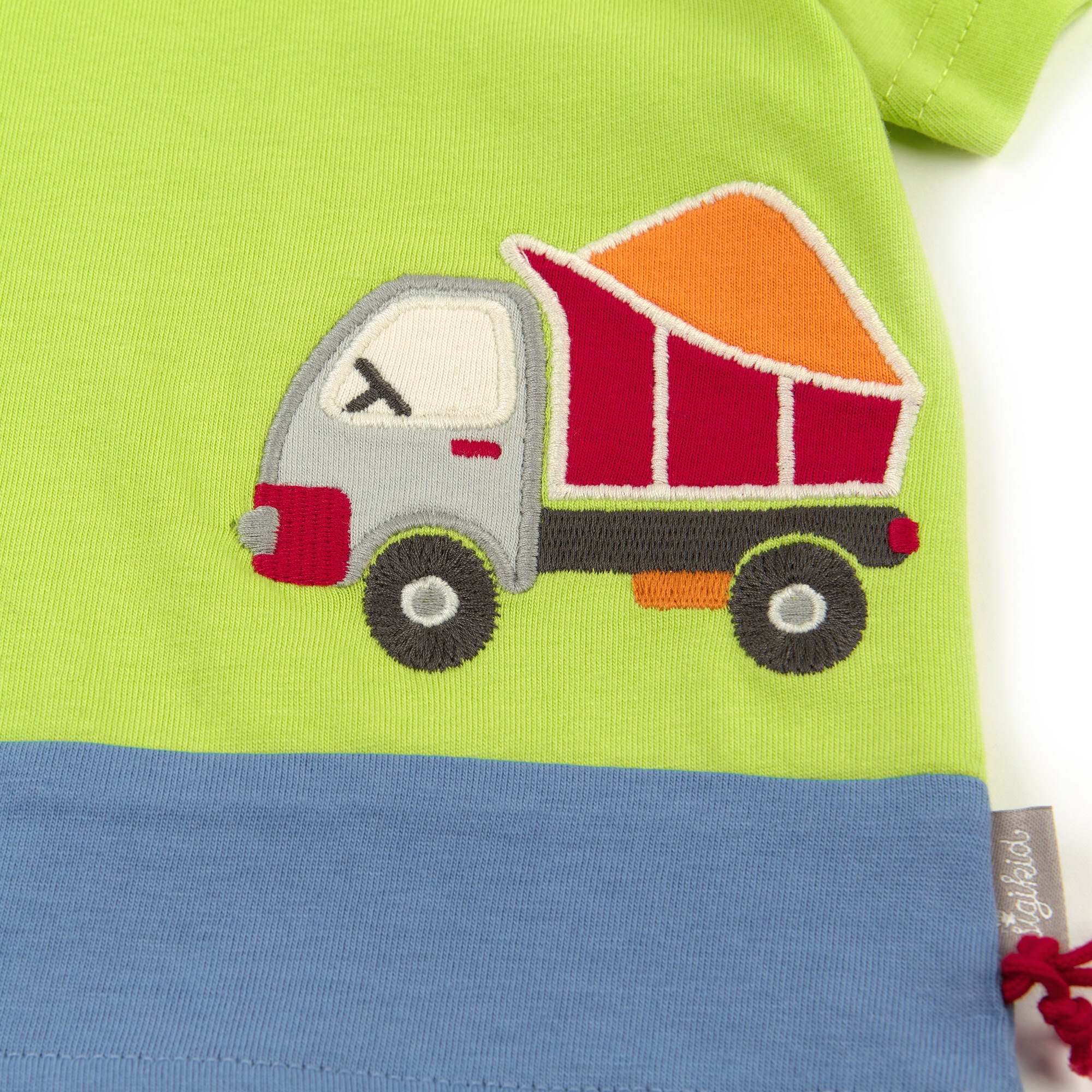 Hellgrünes Baby T-Shirt Truck Stop