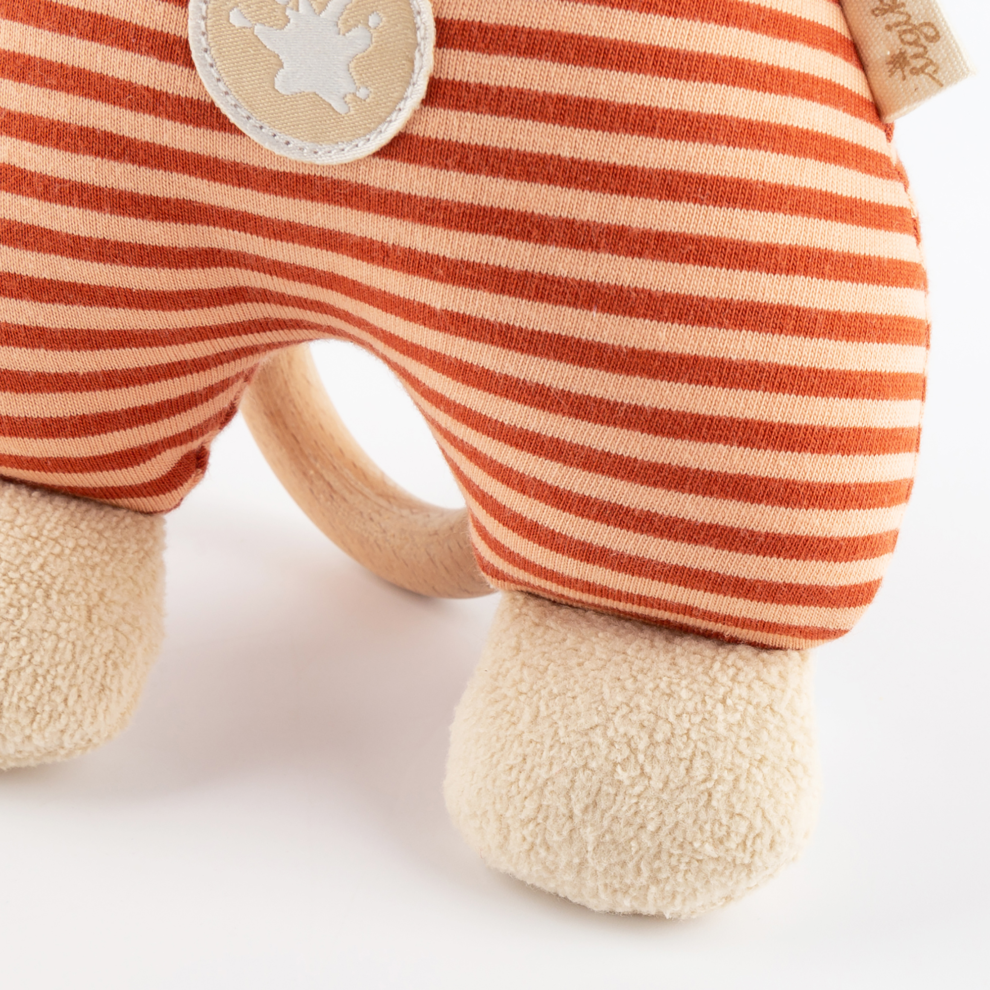 Musical soft toy bear, cream/beige/orange red