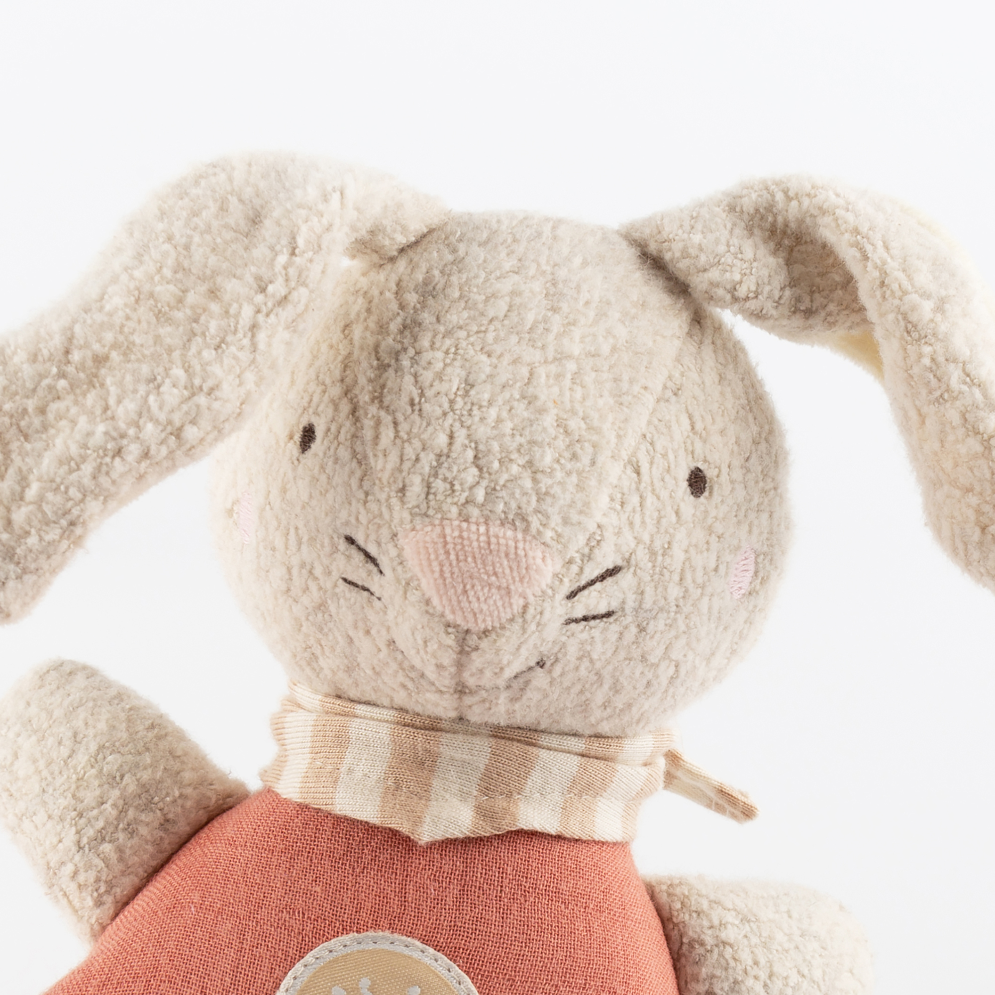 Muslin musical baby soft toy bunny, coral pink