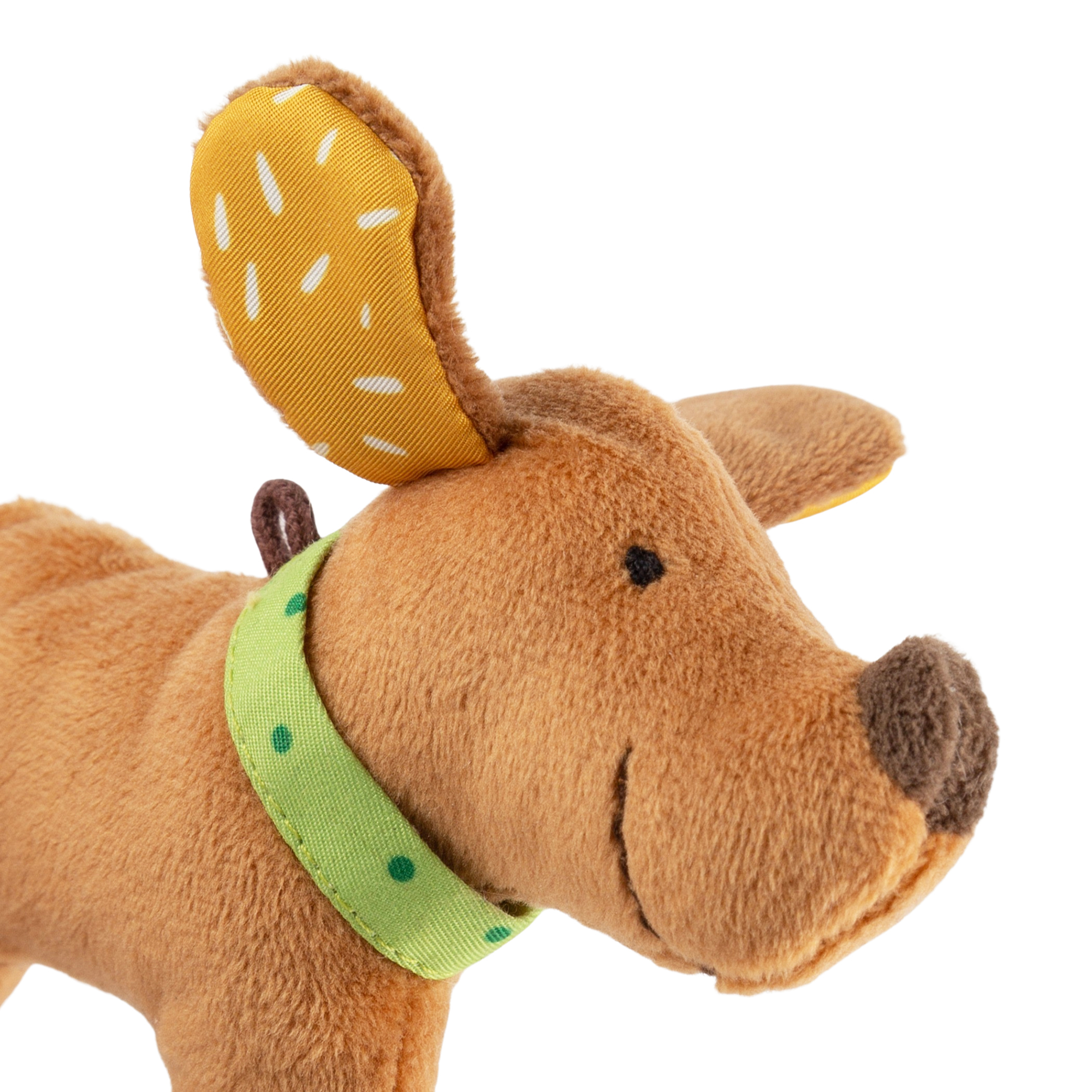 Baby grasping soft toy rattle dog