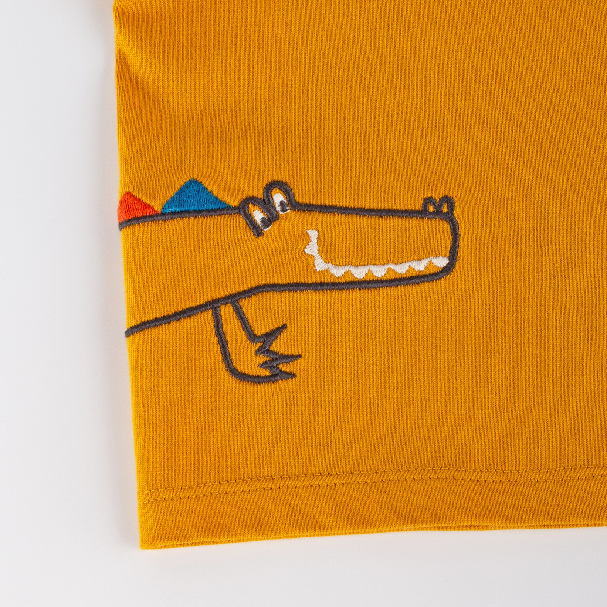 Gelbes Baby T-Shirt mit Krokodil Motiv Gelbes Baby T-Shirt mit Krokodil Motiv