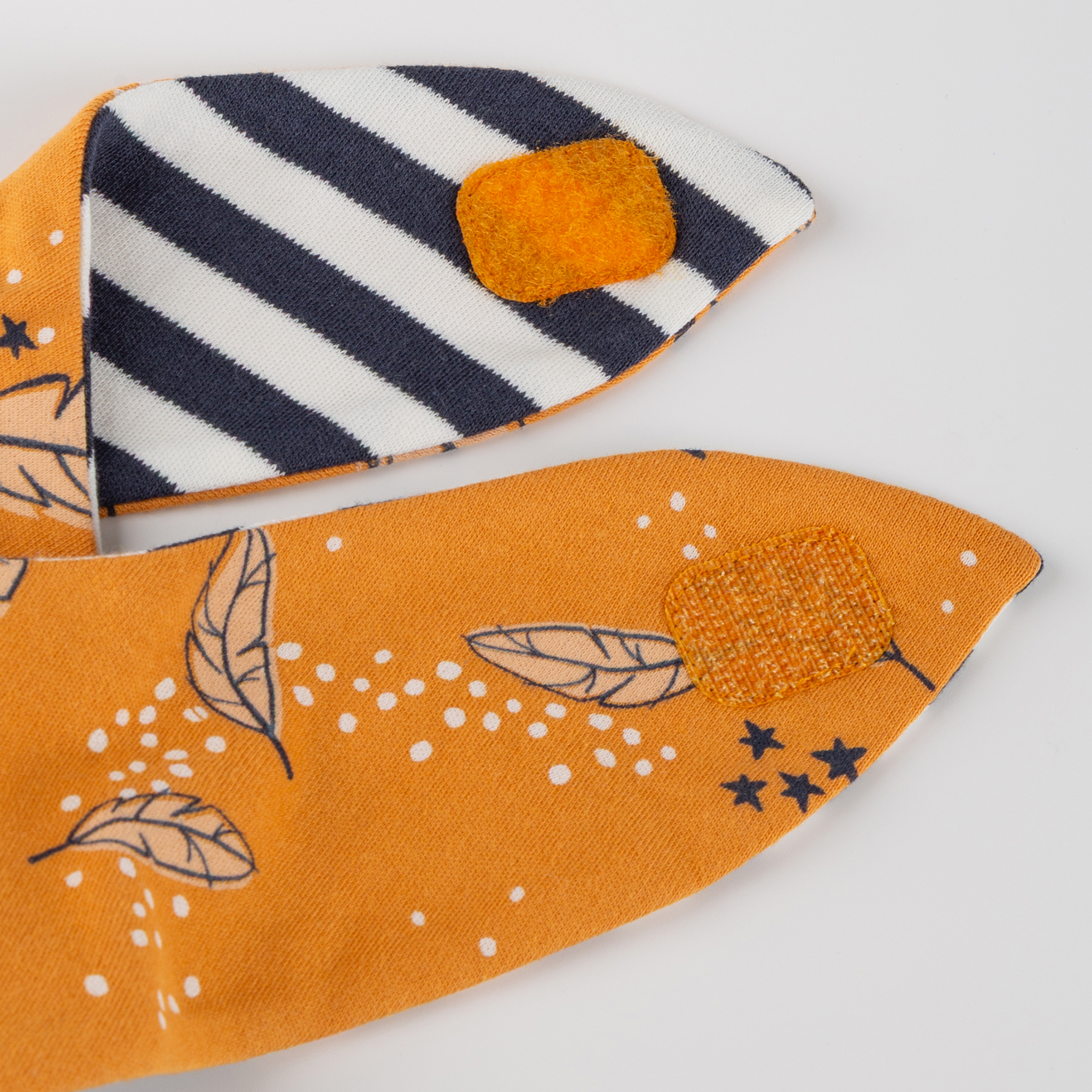 Baby Wendehalstuch Magic Owl, gelb oder blau-weiß geringelt Baby Wendehalstuch Magic Owl, gelb oder blau-weiß geringelt