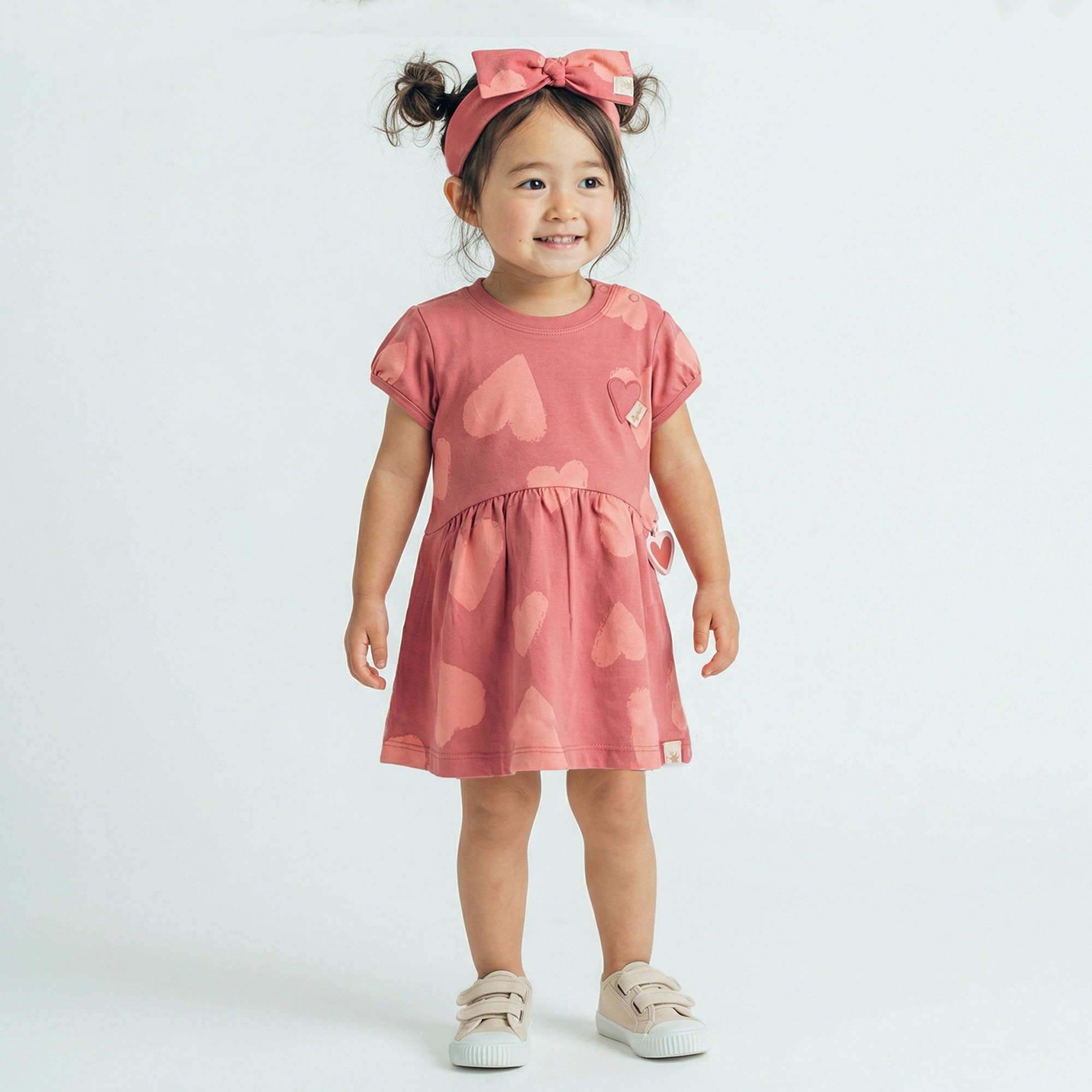 Baby Schleifen Stirnband mit Herzchen Print, rosarot