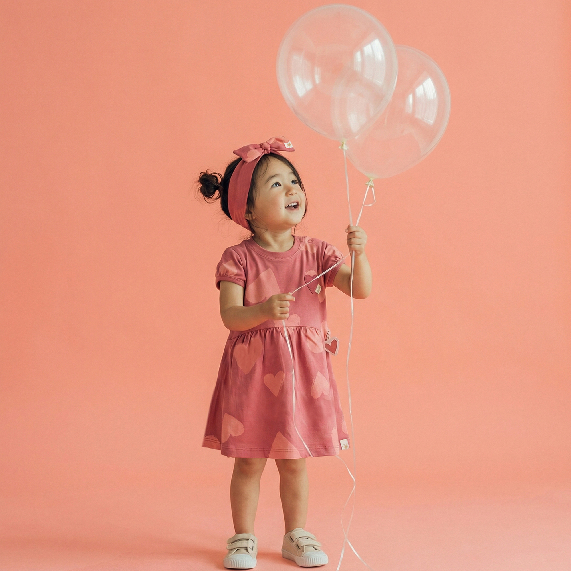 Baby Schleifen Stirnband mit Herzchen Print, rosarot