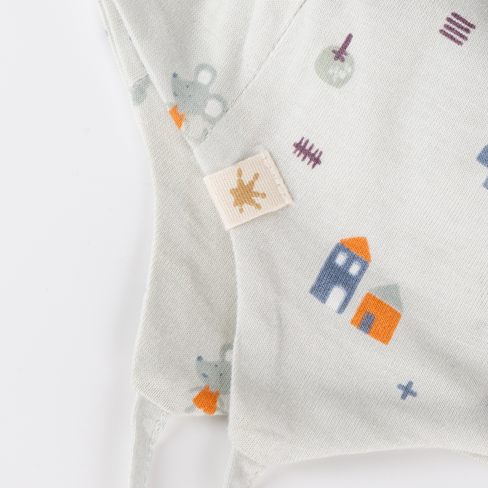 Newborn baby hat with ties, tiny print
